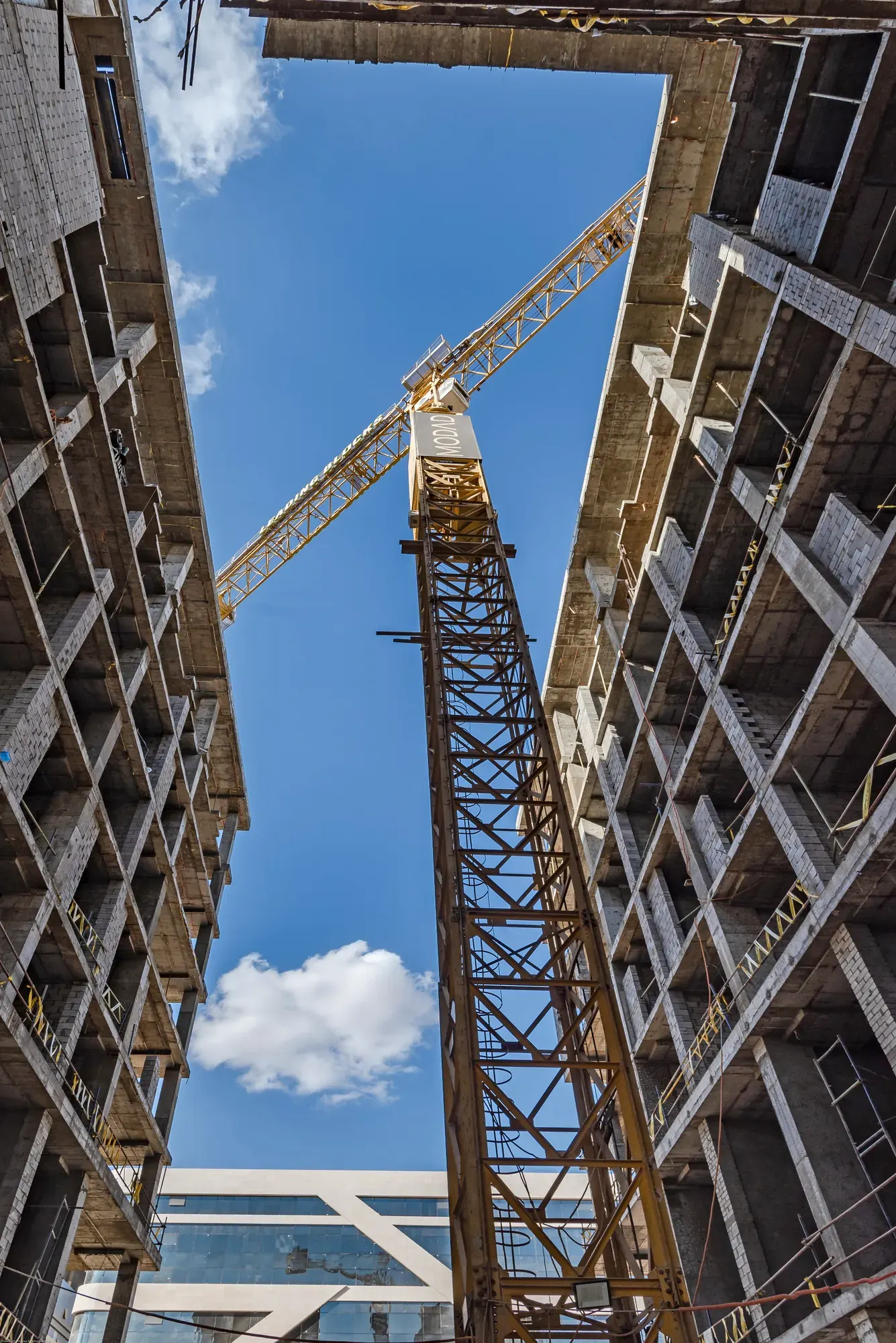 Looking up between the wings at the crane